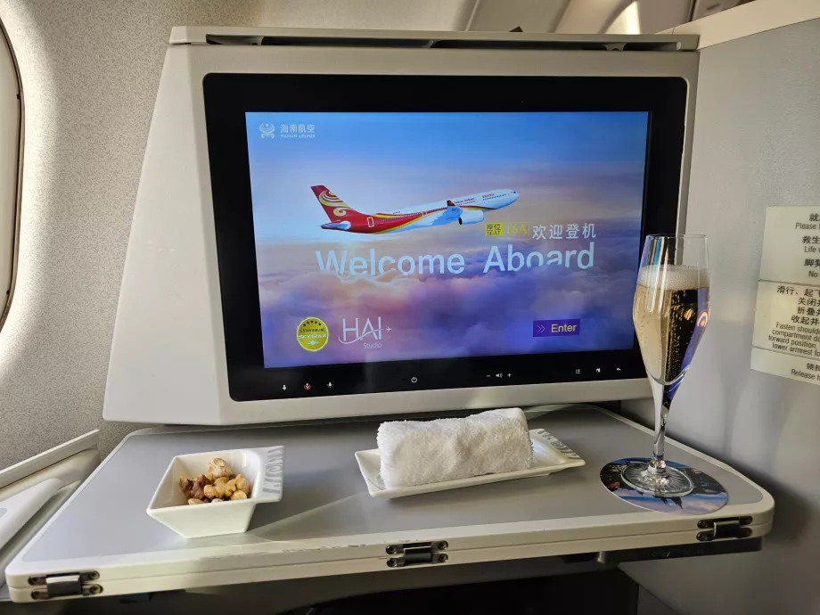 Velkomstdrink, håndkle og skjerm