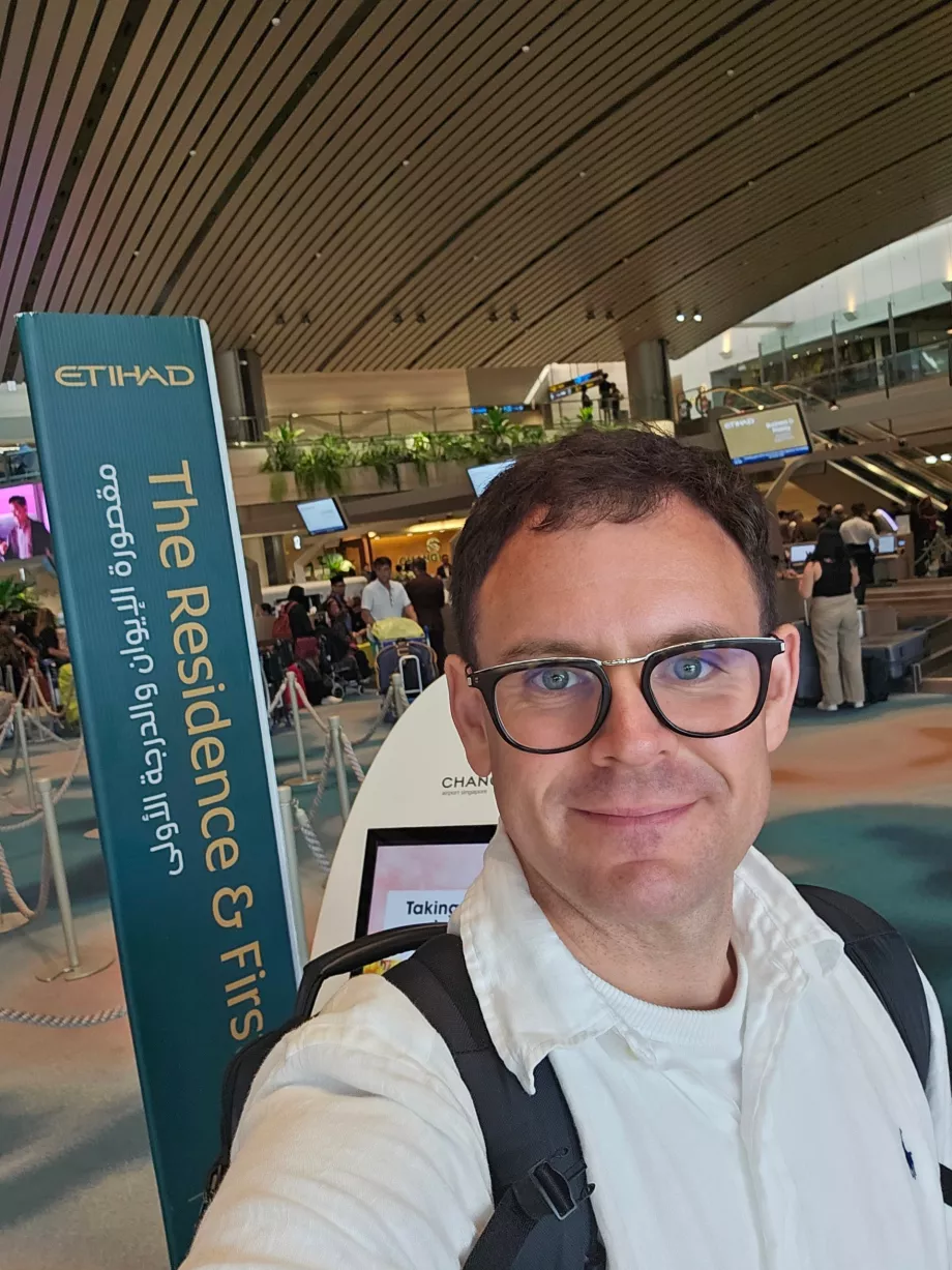 Meg ved innsjekking på Singapore lufthavn